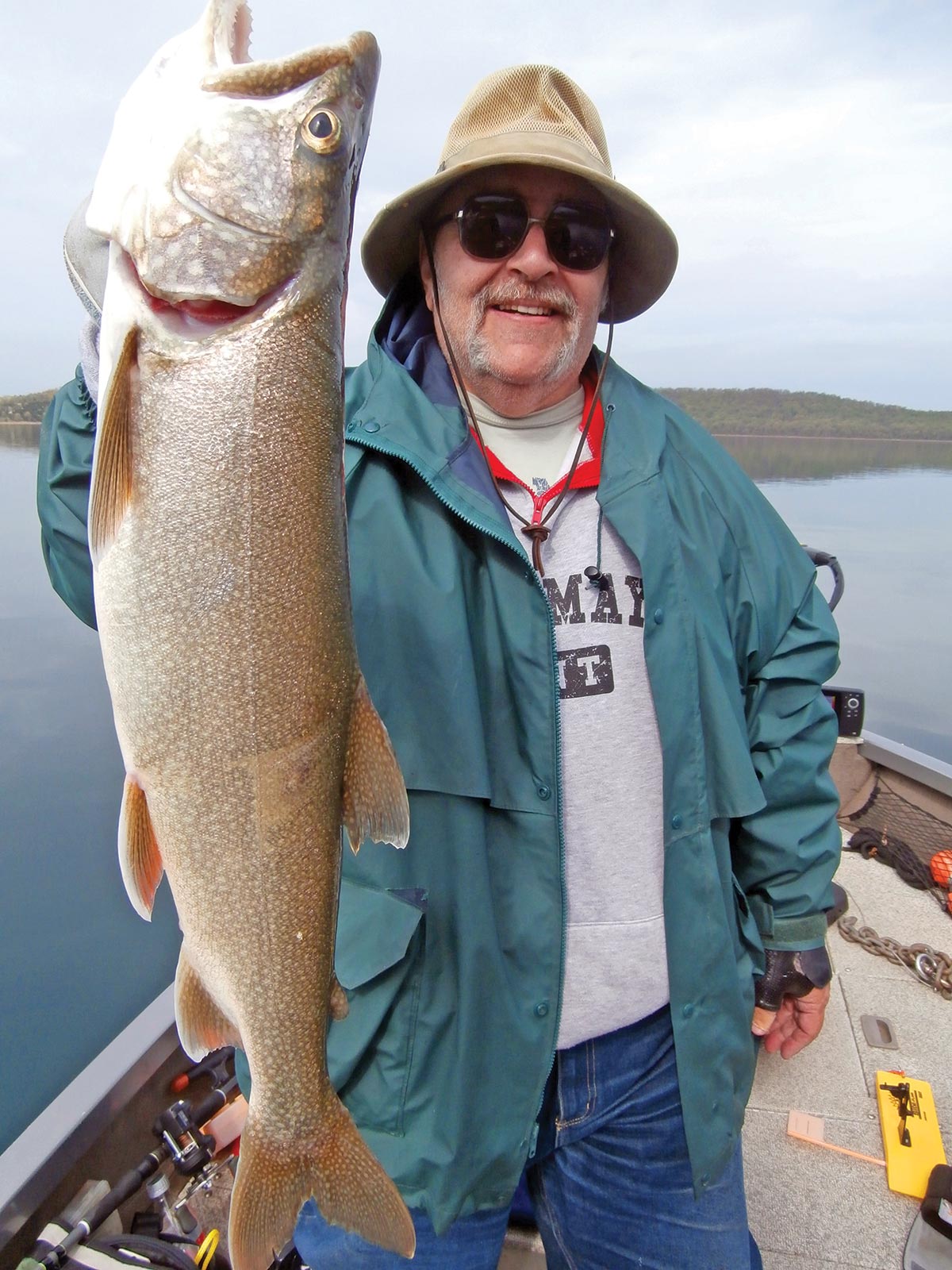 Lou Martinez showing a lake trout