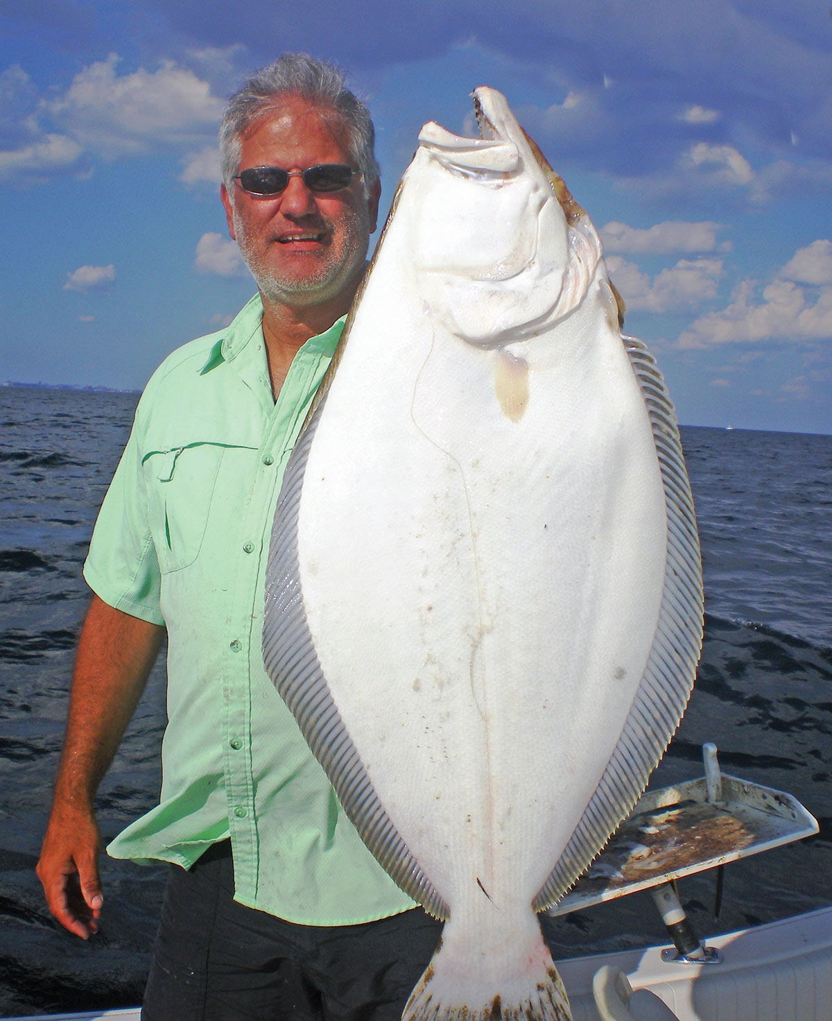 Capt. Bob Schmitt with a big doormat fish
