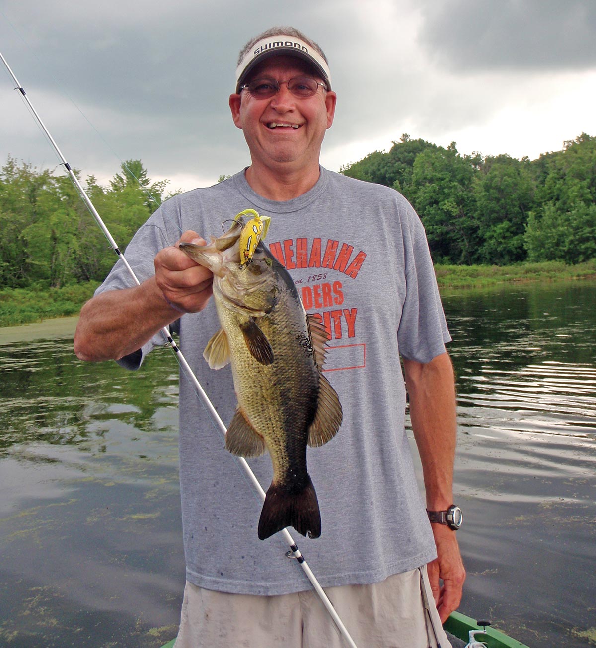 Tom Melton used a weedless frog for this bass in a weed