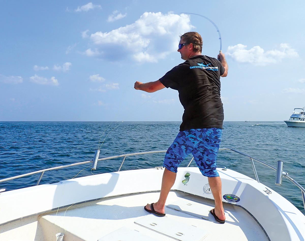 Nick Honachefsky buttoned up to a 5-pound mahi on a Pop Fleye