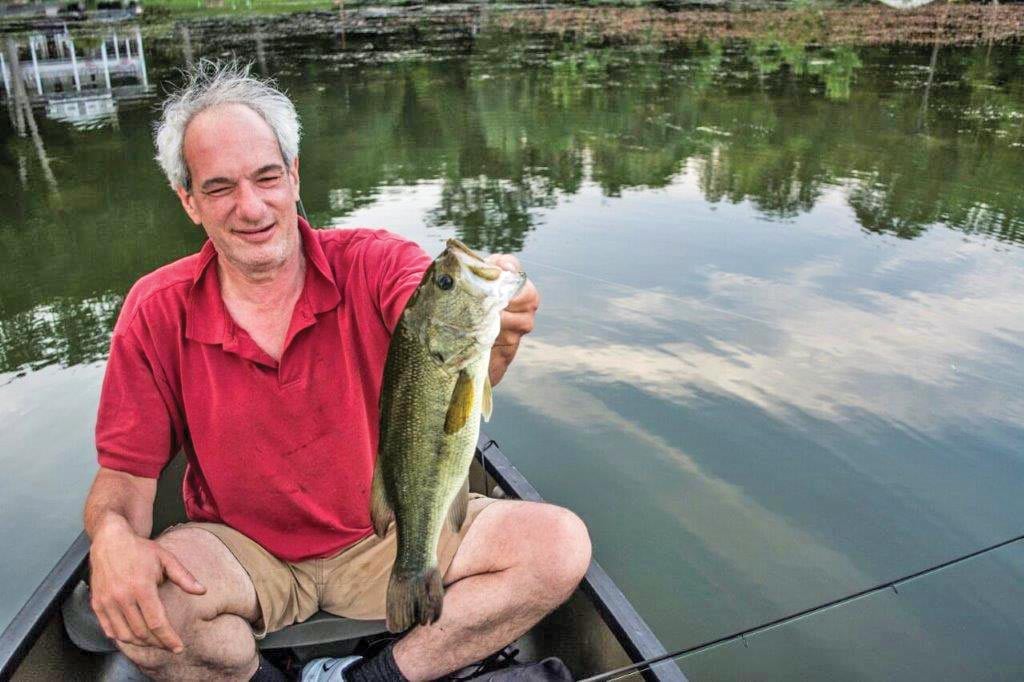 Catching a bass on a late day