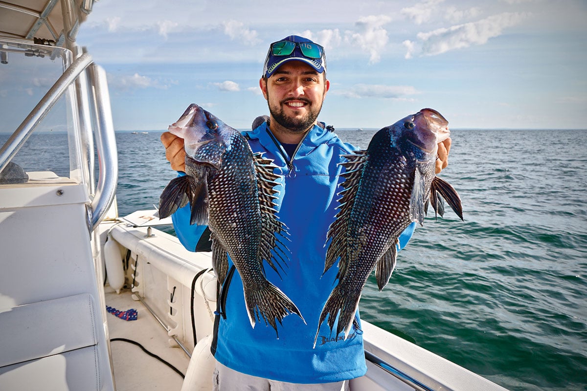 showing off a twin sea bass