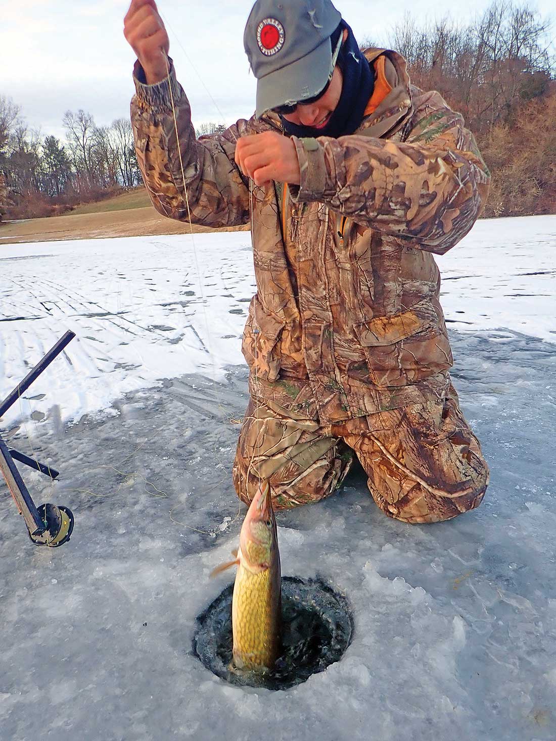 Be sure you have a proper ice auger to drill at minimum a 9- to 10-inch diameter hole to pull a large fish through without having to chip away at the ice.