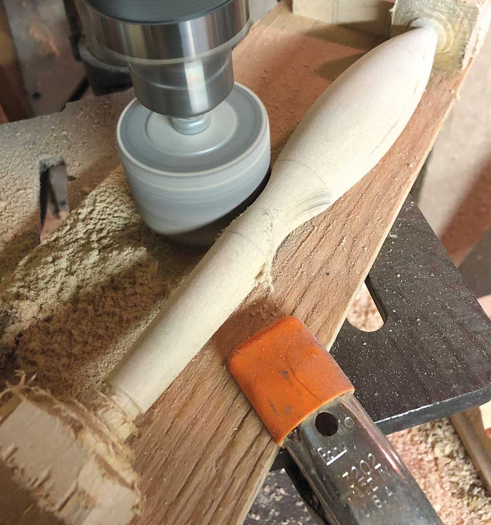 The recessed eye scoops are formed by putting a 2-inch drum sander in a drill press.