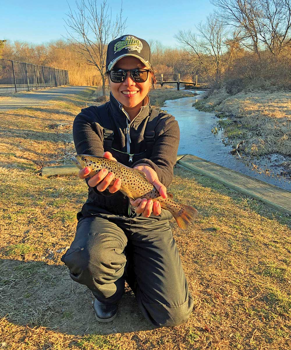 Sheryl Kallo with a nice brown typical of the 2-year-old browns stocked in some Long Island waters. 