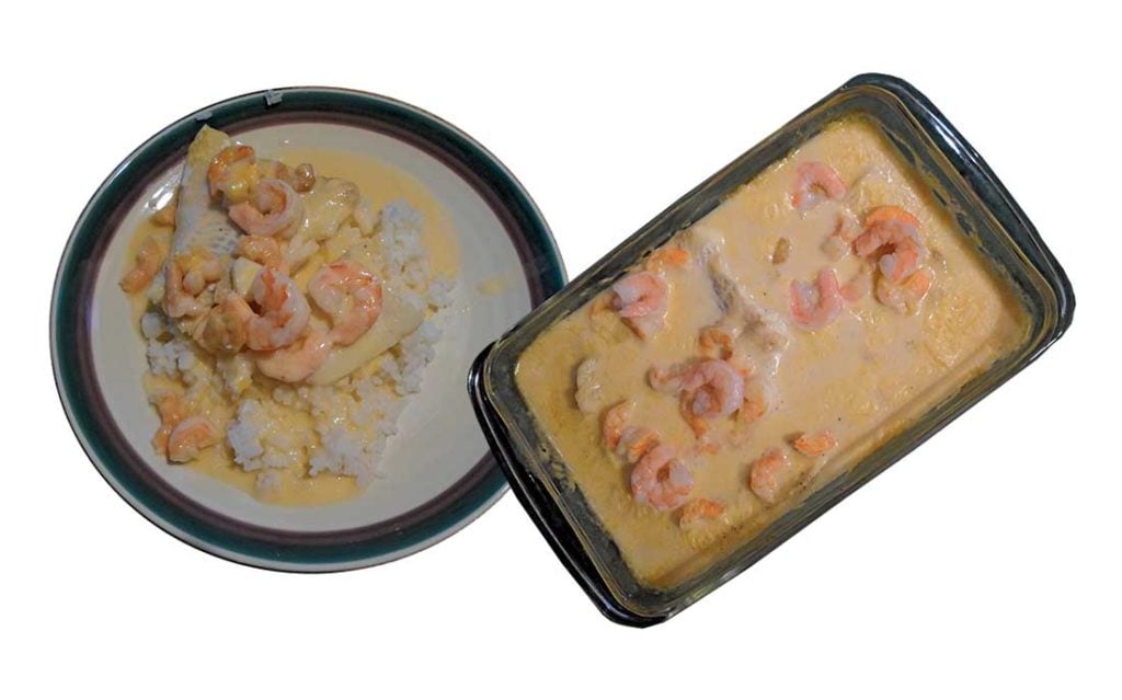 Cooked casserole plated with rice