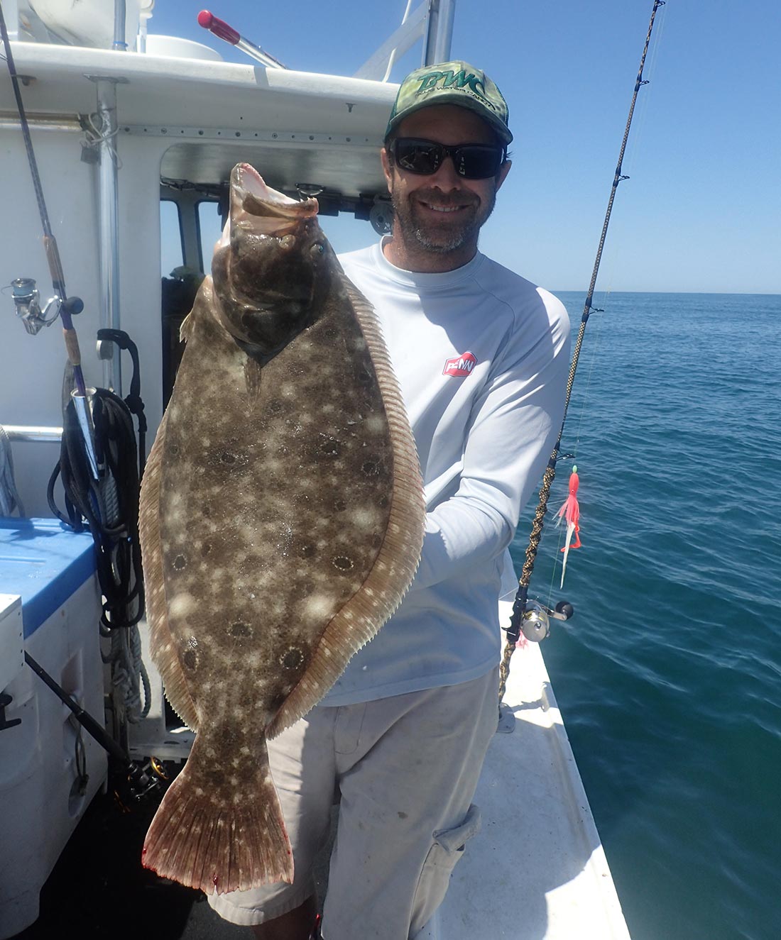The author with an 11.5-pound fluke 