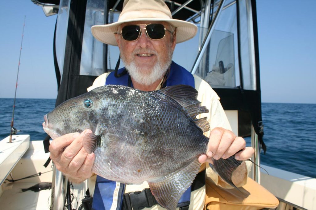 The author with a scrappy, fine-tasting triggerfish