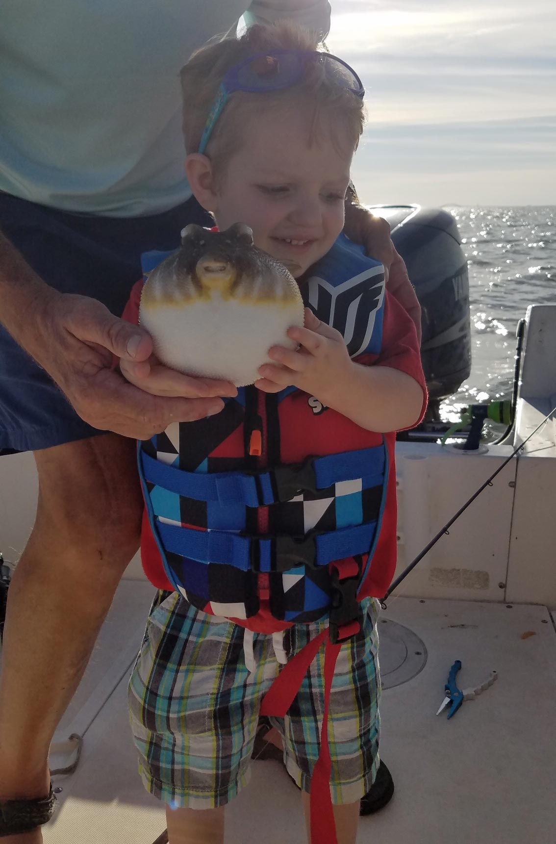 The author’s grandson Alex had a blast with blowfish on a trip last year. 