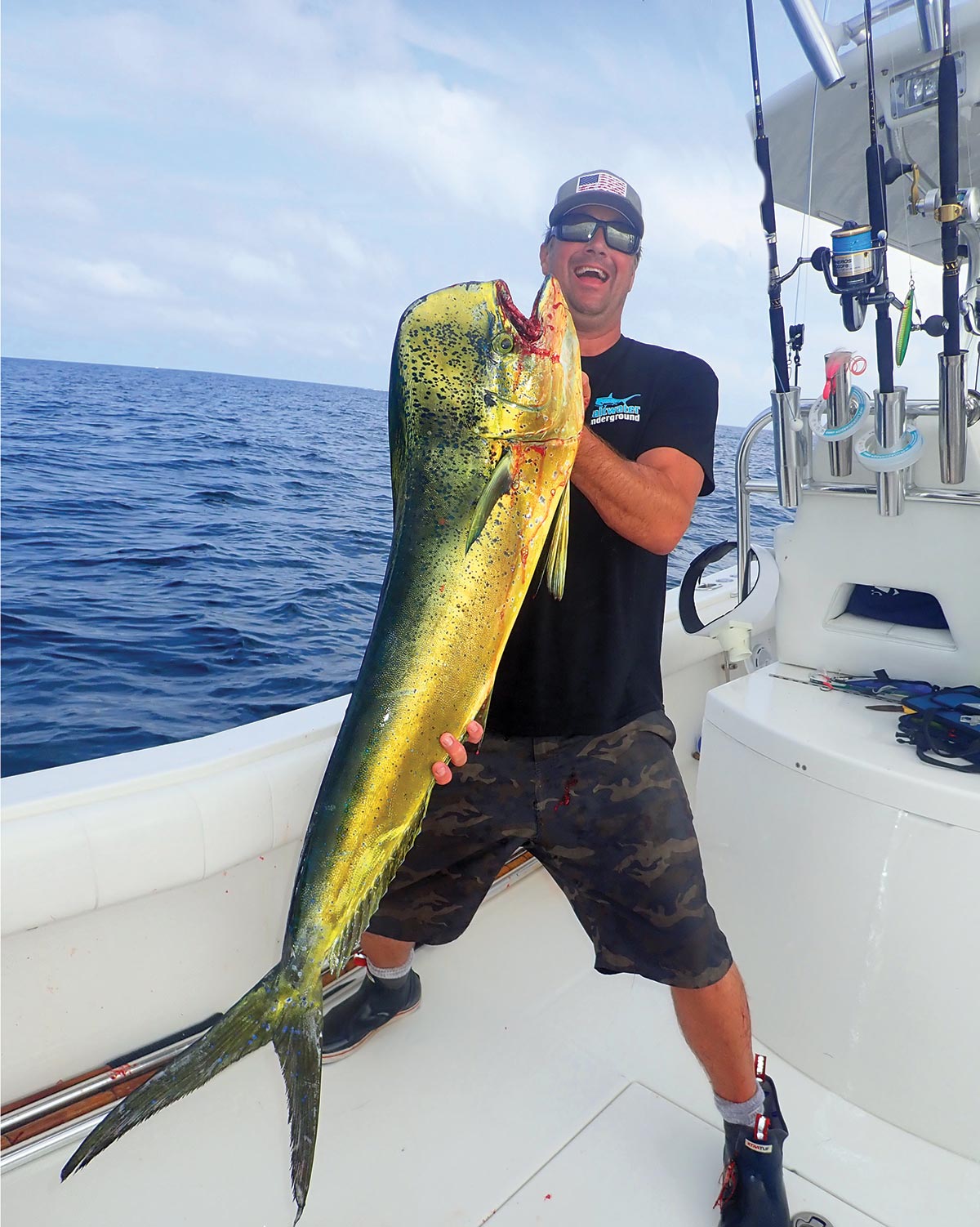 The author shows off a bull dorado 