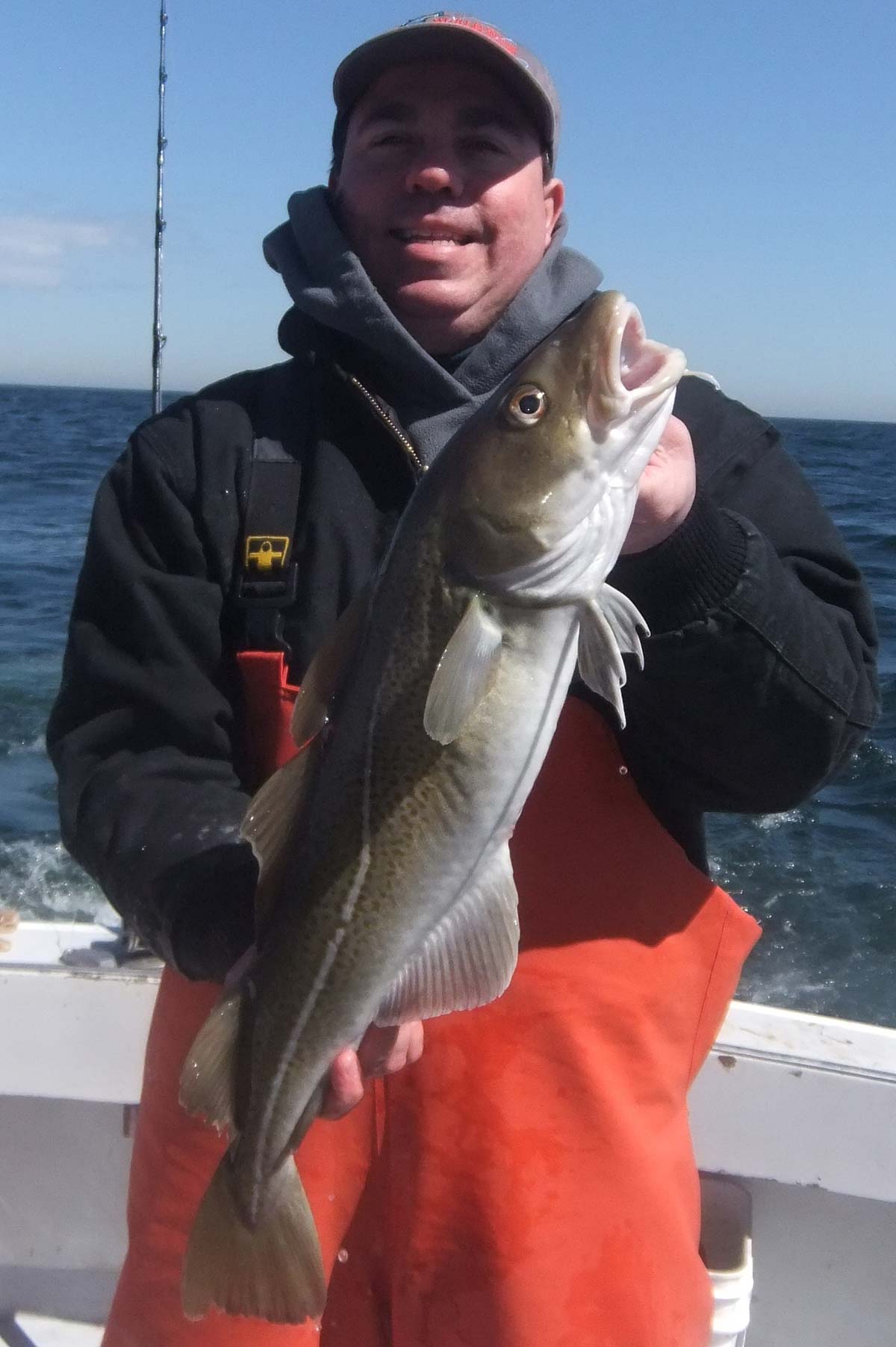 A cold winter day can become rather warm when the cod bite is on.