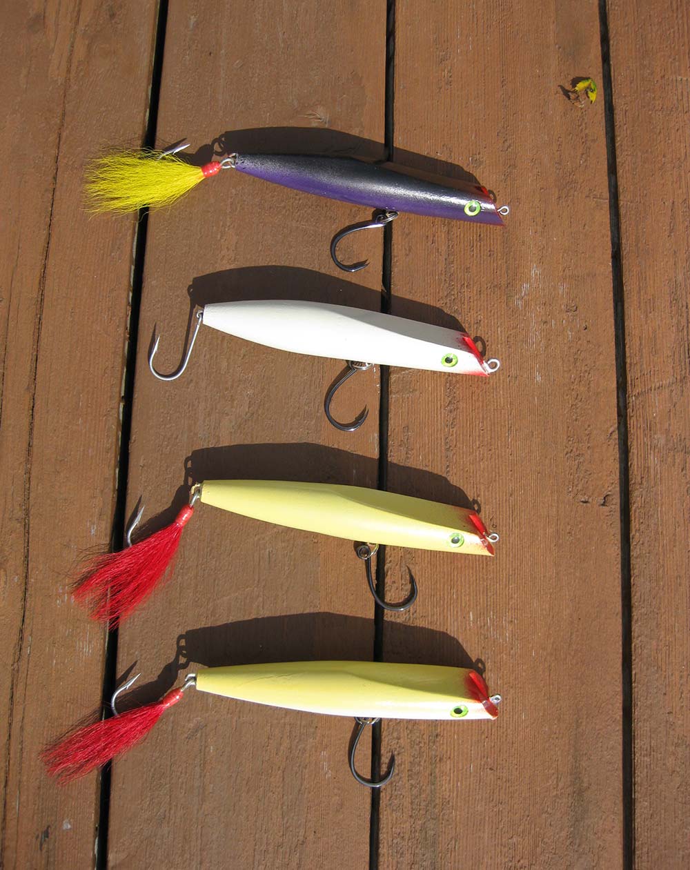 A selection of the author’s homemade darters rigged with in-line hooks and ready to fish.