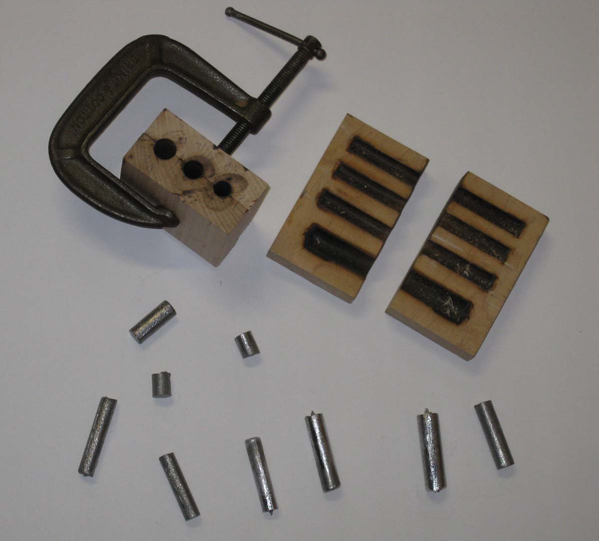 An assortment of lead weights molded by the author.